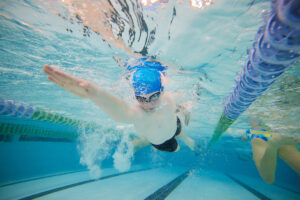 Swimmer competing in Super Swim at State Swim
